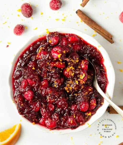 HOMEMADE CRANBERRY SAUCE - real cranberries, sugar , orange juice, water, cinnamon stick is all it takes for fresh, flavorful cranberry sauce #cranberry #thanksgiving #sidedish #cleaneating #happilyunprocessed