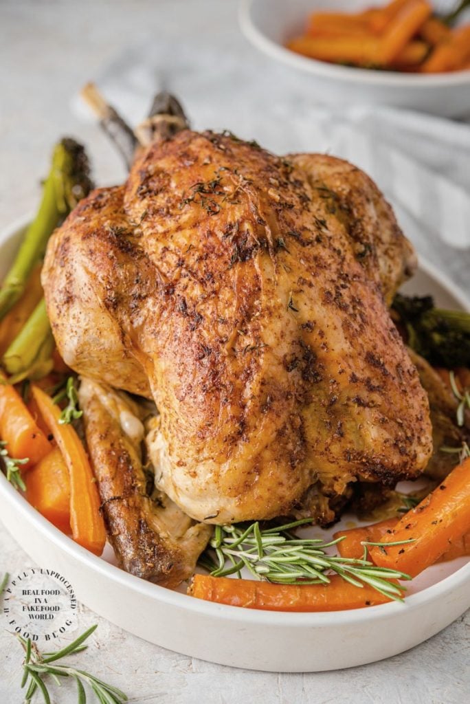 GARLIC HERB CHICKEN - oven roasted chicken with garlic herb butter makes the best gravy #ovenroasted #roastedchicken #chicken #easy #dinner #lowcarb #keto #happilyunprocessed