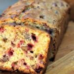 Mom's Cranberry Walnut Bread cranberry loaf sliced in slices