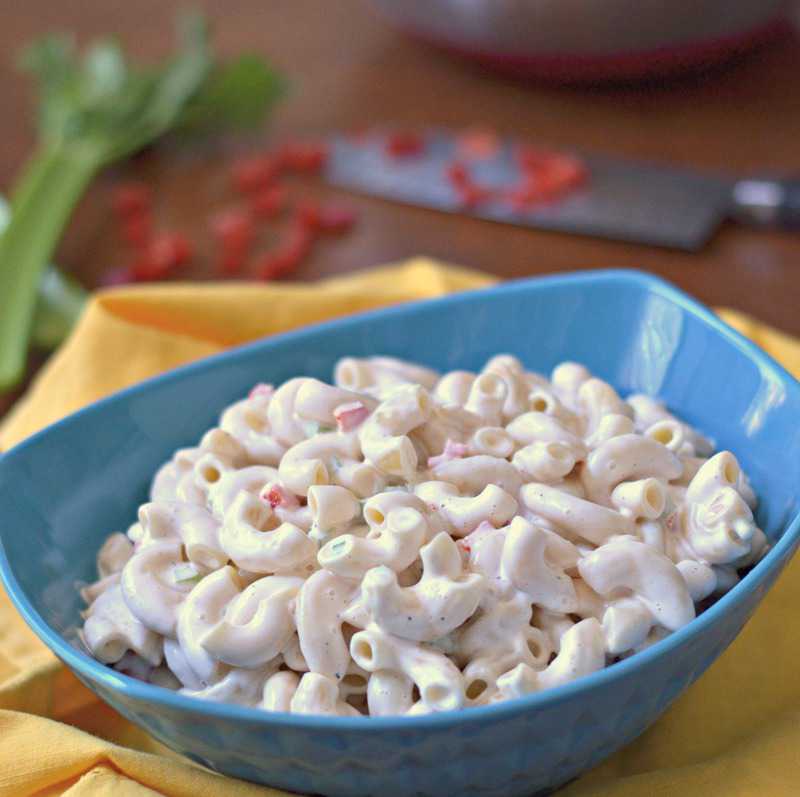 new york deli style macaroni salad in a blue bowl