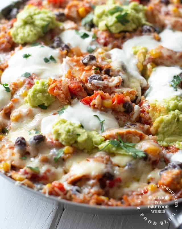 shredded chicken, black beans, corn, tomatoes and rice simmered in enchilada sauce topped with cheese in one skillet