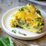 Easy egg frittata with caramelized onions, mushrooms, baby spinach and gruyere cheese #frittat #egg #breakfast #healthy #cleaneating #glutenfree #happilyunprocessed