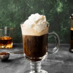 irish coffee with jameson whiskey and whipped cream on top