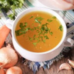 homemade chicken broth in a bowl is full of collagen