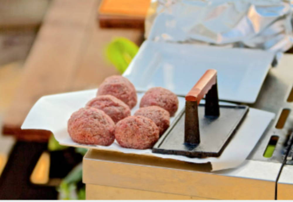 Smash burgers prepared to be grilled