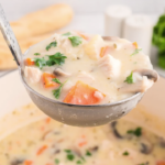 Creamy Leftover Turkey and Rice Soup A ladle filled with turkey and rice soup